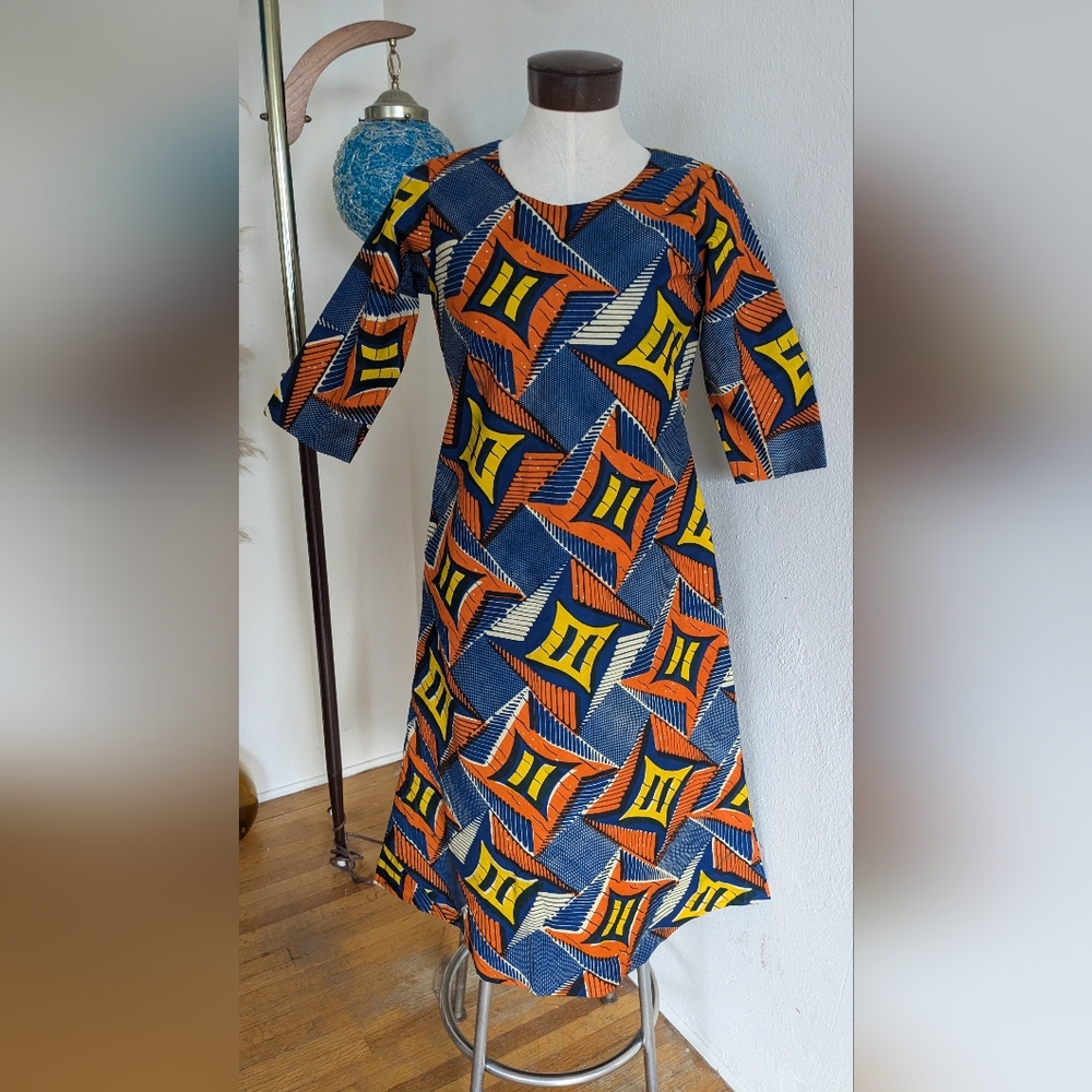 Structured, geometric 60s style dress